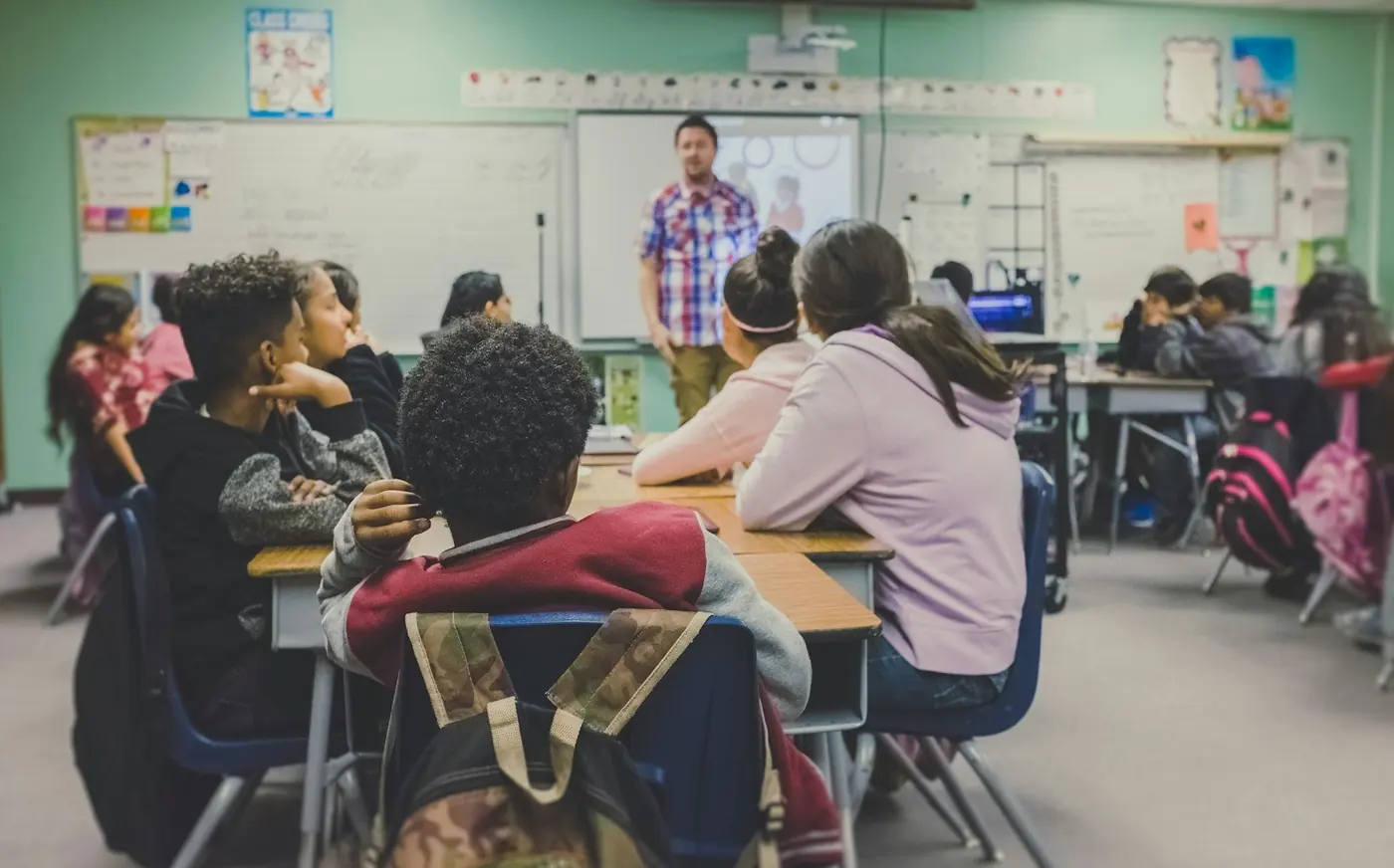 Teacher and students in a classroom