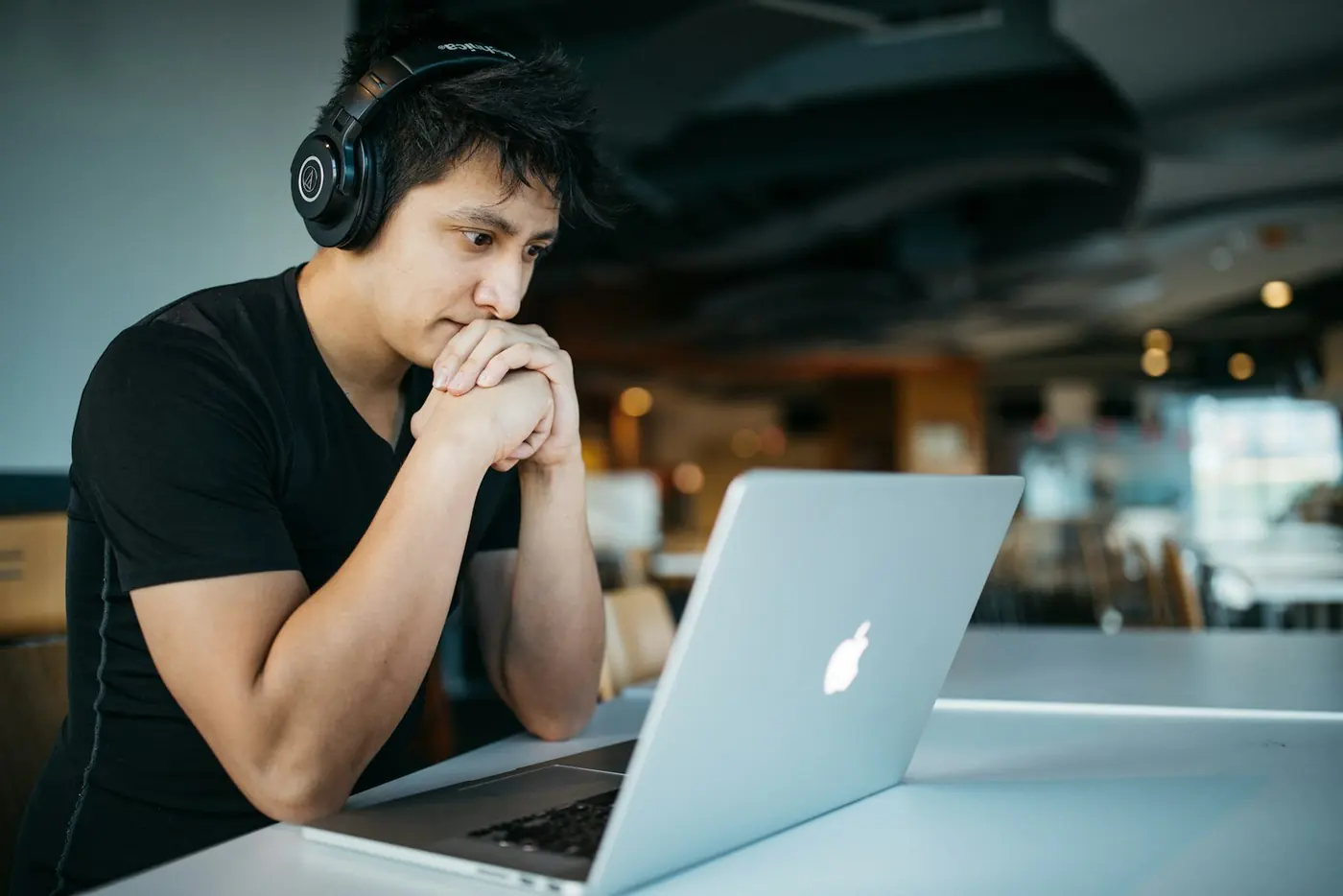 Student working on a laptop during an online practice test